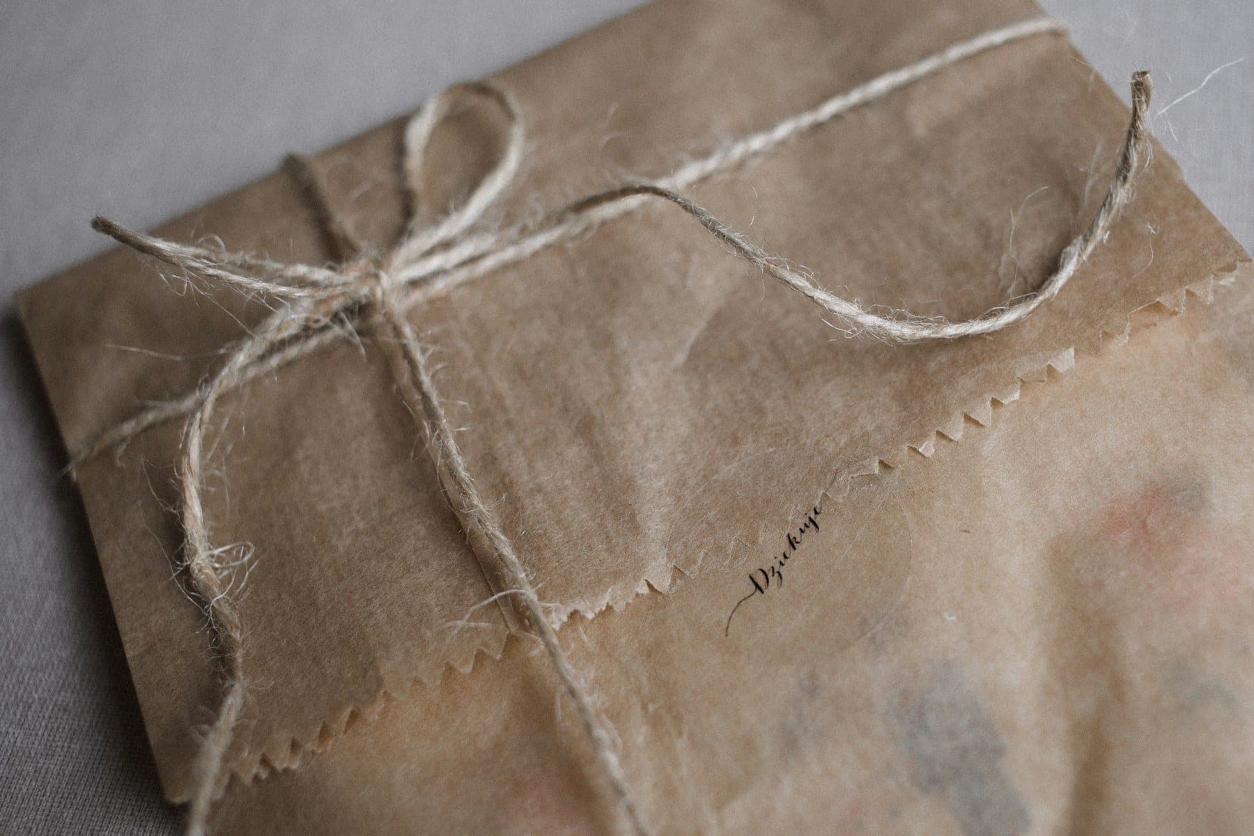 Gift wrapped in kraft paper and tied with natural twine