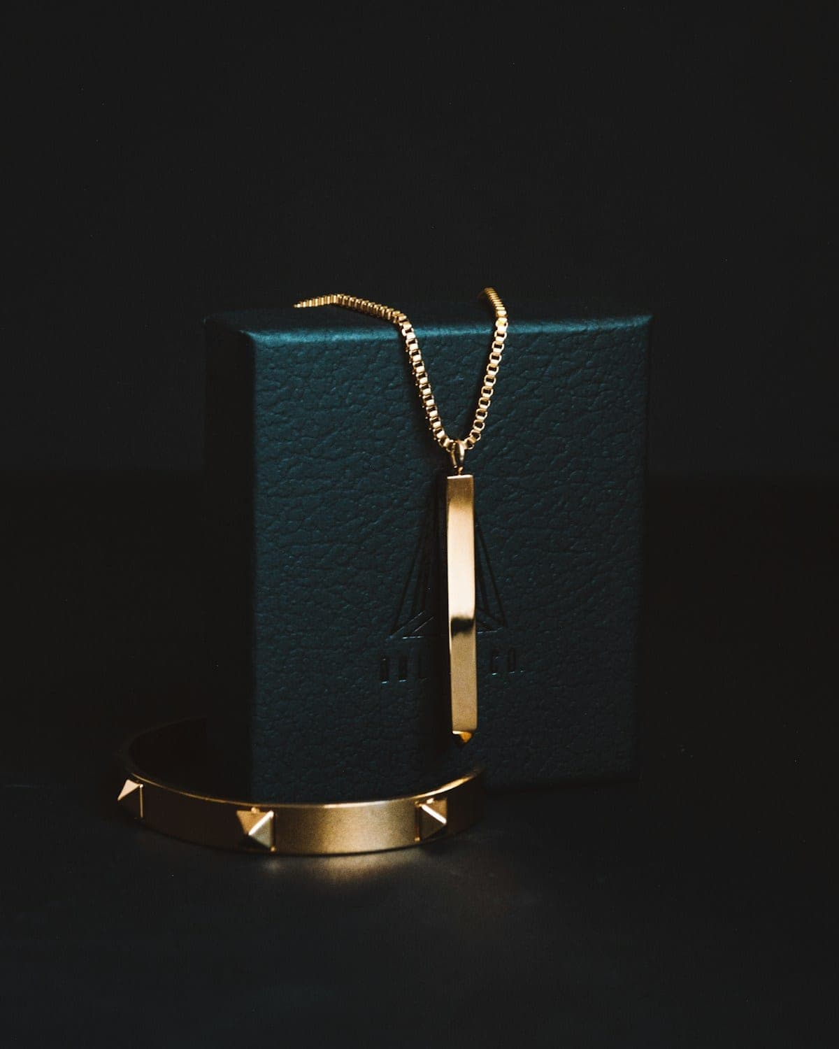 Gold bar pendant necklace and cuff bracelet