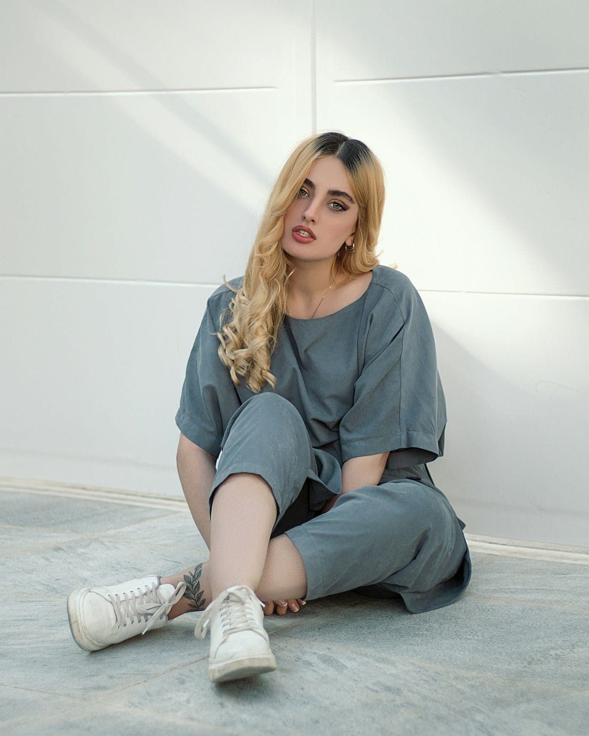 Woman in a relaxed grey-blue co-ord set
